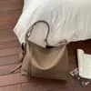 Bolsas Retrô Melanoides para Mulheres 2026 Nova Pequena de Nicho Grande Capacidade Bolsa Tote para o Dia a Dia Simples de Ombro Único Transversal