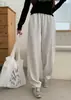 Pantalones largos de mezcla de algodón estilo americano para primavera y otoño, pantalones deportivos casuales anchos y holgados para mujer, de corte recto con una ligera caída y un sutil dobladillo curvo