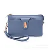 Primavera 2026 Nuevo Lujo Moda Casual Diseño Simple Texturizado Bolso de Hombro Cruzado para Viajes Bolso Cuadrado Pequeño