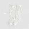 Fábrica de Calcetines Laibo XY140 Verano Nuevos Calcetines para Niños Bebé Puño de Burbuja Lazo Largo Calcetines de Media Pantorrilla Calcetines de Malla