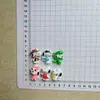 Accesorios lindos de la serie Snoopy al por mayor hechos a mano DIY cable de datos funda para teléfono funda para auriculares pinza para el pelo bolsa para zuecos