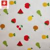 Grande fornecimento de uma variedade de tecido de algodão estampado infantil com desenhos de frutas para sacolas de roupas, estoque spot para atacado