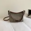 Bolso de Axila para Mujer 2026 Nuevo Verano de Moda Tendencia Bolso de Hombro para Viajar Bolso Cruzado Cubo Exquisito Versátil