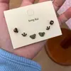 Pendientes de Dibujos Animados Coloridos Lindos Versátiles Traje Exquisitos Pequeños Corazón de Niña Pendientes de Sentido de Diseño Único de Nicho