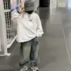 Jeans para Niños Primavera y Otoño 2026 Nuevo Estilo Otoño Moda Salpicaduras de Tinta Denim Pierna Ancha Pantalones Largos Niños Medianos y Grandes Transfronterizos Modernos