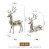 Un par de adornos de ciervos navideños, juego de estatuas de ciervos, desplegados exquisitamente, decoración moderna para mueble de TV y bar, artículos para el hogar preparados para familiares y amigos