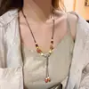 Colar Boêmio Estilo Retrô Colar com Pingente de Borboleta de Cerâmica Estilo Hong Kong Novo Colar Estilo Étnico Feminino Estilo Longo