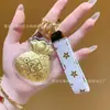 Pingente de ouro puro 999, chaveiro de couro de saco da sorte, pingente de bolsa, corrente de celular, acessório de bolsa, atacado
