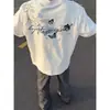 Camiseta Bordada Pesada Floral de Manga Corta Estilo High Street Americano 2026 para Hombre, Nuevo Estilo de Verano, Tendencia Nacional Unisex de Media Manga