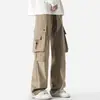 Calças de trabalho masculinas para atividades ao ar livre, tamanho grande, estilo americano, design com múltiplos bolsos, corte reto, adequadas para o outono, impermeáveis e projetadas para atividades ao ar livre.