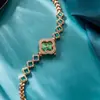 Liga viva de quatro folhas trevo moda pulseira decorativa relógio de quartzo esmeralda relógio feminino relógio mulheres fabricantes de relógios atacado
