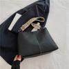 Alça de ombro larga estilo coreano de grande capacidade casual artística bolsa feminina 2024 primavera nova commuter ombro crossbody tote bag