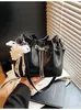 Bolso pequeño popular transfronterizo para mujer Verano 2025 Nueva moda Nicho Bolso bandolera Fruncido con cordón Bolso de cubo