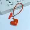 Huayang estilo minimalista pingente de coração de couro alça de celular cordão de PU pingente acessório de bolsa pulseira de pulso alça de transporte portátil