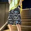 Moda masculina de verano 2026 nueva marca pantalones de pierna ancha, estampado digital, transpirables, shorts de cinco puntos, shorts simples y holgados para mujer