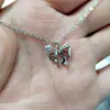 2023 Nuevo collar de mariposa hueca hip hop todo partido colgante de mariposa de circón accesorios de moda geniales para la tierra sentido del diseño