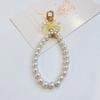 Llavero Colgante de Cadena de Perlas DIY con Lazo Nueva Flor de Metal Accesorios para Tarjetas Bolsa de Audífonos Accesorios para Llaves Femeninos