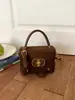 Bolsa Cuadrada Pequeña de Bloques de Color al por Mayor Bolso Elegante de Temperamento 2025 Versátil Cerradura Bolso de Hombro Único Estilo Pequeño Chanel Bolso Cruzado