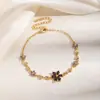 Pulsera de flor de cinco pétalos colorida con incrustaciones de circonita cúbica de cobre para mujer estilo bosque fresco flores multicolor pulsera de cadena fina accesorios joyería transfronteriza venta al por mayor