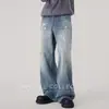 Jeans acampanados estilo americano de alta costura para hombre, temporada Primavera/Otoño 2026, con diseño lavado, efecto salpicadura de tinta y corte holgado hasta el suelo