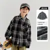 Camisa de manga larga a cuadros para niño 2026 primavera y otoño nueva camiseta transpirable con cuello de solapa para niños mayores ropa de otoño