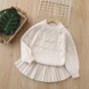 Conjunto de Falda Suéter para Niña 2025 Otoño Nuevo Tejido a Mano con Flores de Dos Piezas Traje Dulce de Suéter para Niña Pequeña