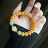 Pulseira Bodhi Dunhuang de transmissão ao vivo pega gato da sorte design de laço único pulseira versátil wrap dedo macio acessórios culturais para estudantes