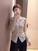 Suéter de punto de manga larga con bloques de color de alta gama para mujer, nuevo estilo otoño/invierno, bellamente único, adelgazante y versátil capa base