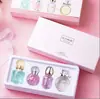 Set de tres piezas de Perfume Femenino de Marca Transfronteriza, Fragancia Fresca Amaderada Floral, Caja de Regalo de Cuatro Piezas para Hombre, Fragancia Ligera de Larga Duración