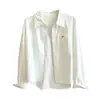 Camisa jeans de algodão lavado estilo coreano para mulheres, novo modelo outono 2026, com gola de lapela, caimento solto, versátil, de manga comprida, top casual, moderno