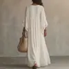Site independente 2026 Roupas femininas transfronteiriças europeias e americanas retalhos de renda decote V vestido longo manga morcego vestido de férias para praia
