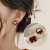 Pendientes asimétricos de lujo ligeros y de alta gama con un toque distintivo para mujer, elegantes y modernos, accesorios para las orejas que combinan con todo.