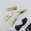 Extractor de aleación con dientes de cobre dorado y lengüeta de extracción negro pistola, Selección de ropa casera de Taizhou, Cremallera metálica mejorada