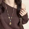 Collar de Pony de Madera para Niñas 2026 Nuevo Otoño e Invierno Cadena Larga para Suéter Accesorios Ligeros de Lujo de Gama Alta para el Año de Nacimiento