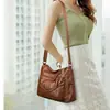 Bolsa tote grande para atacado para mulheres de meia-idade, nova bolsa de ombro casual retrô para sair, bolsa transversal para mães