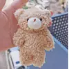 Colgante de oso sonrojado lindo Colgante para bolsa de peluche Oso conjoined femenino Llavero creativo Muñeca fábrica regalo