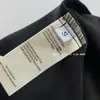 Falda de temperamento superadelgazante cola de pez elegante entallada a la cintura corte al bies cuello redondo manga corta acetato pequeño vestido negro 11805