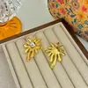 Pendientes Dorados en Forma de Fuegos Artificiales de Nuevo Estilo Europeo y Americano Lugong para Mujer, Pendientes y Aretes de Estilo Metálico Exagerado con Aguja de Plata