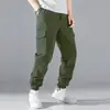 Outono 2024 Novo Casual Cor Sólida Múltiplos Bolsos Calça de Guindaste Calça com Cordão Calça Tática