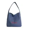 Bolsa Tote de Gran Capacidad para Mujer, Estilo Nuevo para Compras y Viajes, Bolso de Hombro Versátil, Bolsa de Nicho para el Trabajo y los Viajes Diarios para Mujer