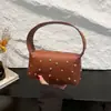 Verano 2025 Pedido Extranjero Personalizado Retro Moderno Bolso de Hombro Elegante Moda Remache Bolso Almohada de Axila