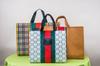 En stock bolsa no tejida protección ambiental bolso personalizado tienda de ropa bolsa no tejida libro rojo pequeño bolsa para ropa alto sentido