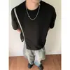 Diseño playera de manga corta estilo americano T-shirt verano tendencia nacional unisex top de media manga cierre cremallera holgado bloques de color cuello redondo