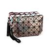 Bolsa plana de mano con patrón de rombo estilo europeo y americano, forma de gota de agua, Bolsa de maquillaje Diamond Magic, bolsa de maquillaje portátil y conveniente, outlet de fábrica