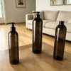 Ventas Directas de Fábrica 24 Dientes Botella Hombro Redondo 300ml Mascota Negra Transparente Set de Cuidado Hotel Botella de Loción Delgada