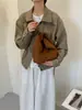 Nova bolsa plissada nuvem de camurça 2026, design retrô estilo coreano, exala uma vibe sofisticada e elegante, adequada para o dia a dia, pode ser carregada como bolsa de ombro, bolsa de axila ou bolsa de mão