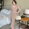 Comercio exterior ropa de mujer 2023 foto real Han Ke quiere adelgazar falda básica de otoño e invierno vestido de punto de manga larga hueco adelgazante ajustado
