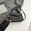 Bolso de hombro y bandolera elegante de color liso con textura, nuevo bolso pequeño cuadrado con patrón tejido 2025, bolso popular para mujer este año