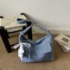 Otoño 2026 Nuevo Bolso de Mezclilla Bolso Cruzado Casual Estilo Perezoso Bolso de Tela Artístico para el Trabajo Bolso Cruzado Pequeño