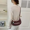 Bolso de Axila de Gama Alta de Nicho para Mujer Otoño 2026 Nuevo Retro Textura de Viaje Bolso de Hombro Único Bolso Cruzado de Media Luna